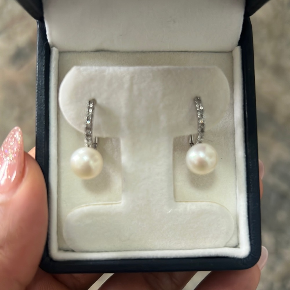 Diamond and Pearl earrings by Macys